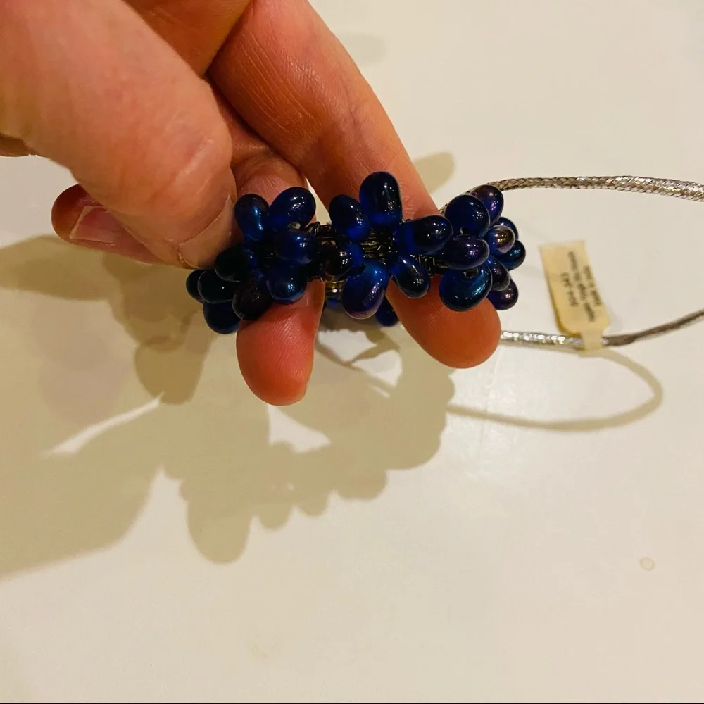 NWT Crate & Barrel 4 Napkin Rings.Blu Iridescent Beads.Great for casual or party